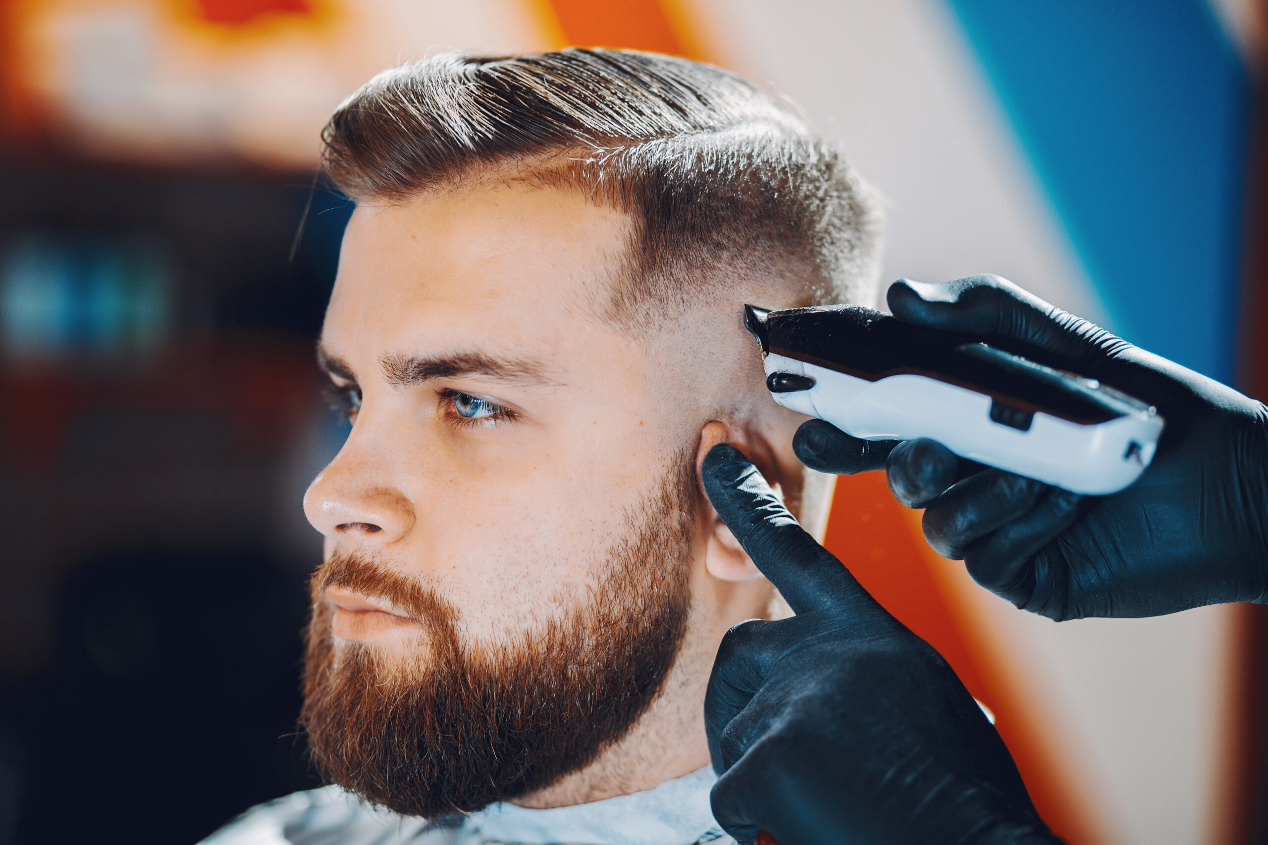 stylish-man-sitting-in-barbershop-II-scaled